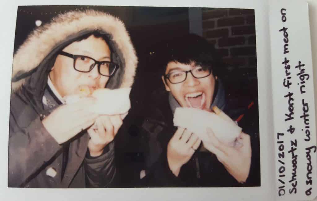 Instax Memory - Kent and Anson outside of Schwartz eating smoked meat sandwhiches in the winter