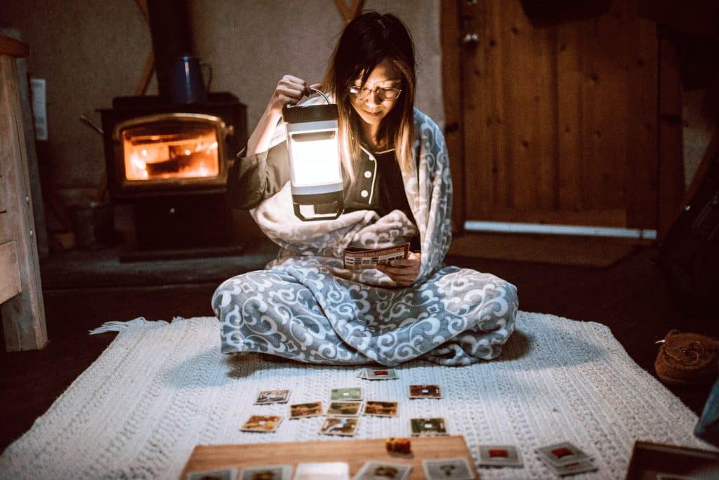 Battery-powered lantern saving the night so that we can learn to play new board games