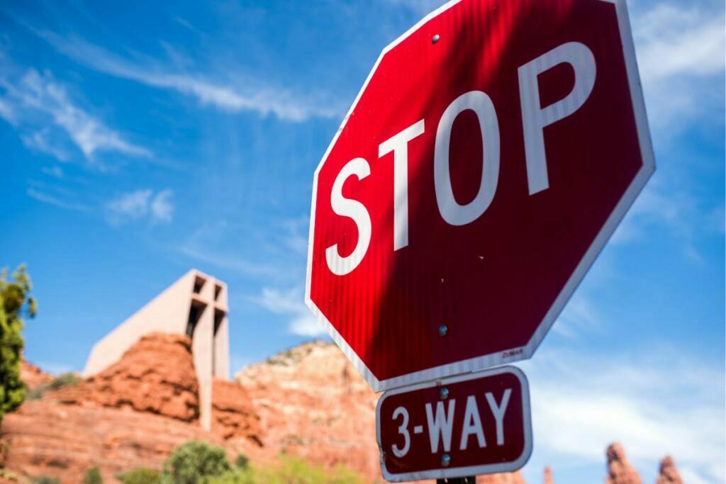 Stop Sign outside of the Chapel of the Holy Cross