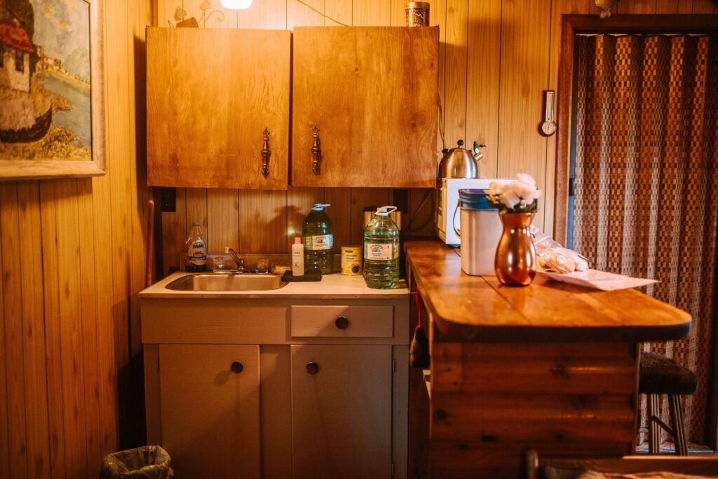 Kitchenette inside the cozy rustic cabin in Minden, Ontario - Hipcamp Canada Listing